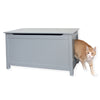 orange cat coming out of large litter box furniture storage chest